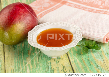 Sweet dessert orange mango puree Sweet dessert orange mango puree 127345176