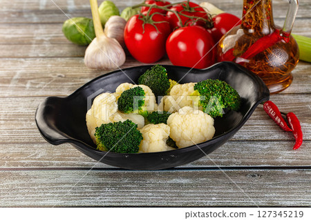 Vegan cuisine Steamed cauliflower and broccoli cabbage 127345219