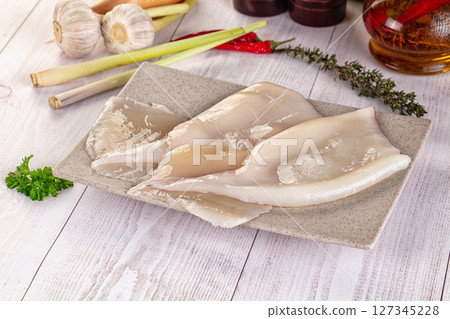 Raw calamari bodies for cooking Raw calamari bodies for cooking 127345228