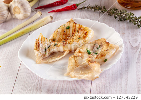 Fresh grilled calamari with herbs Fresh grilled calamari with herbs 127345229