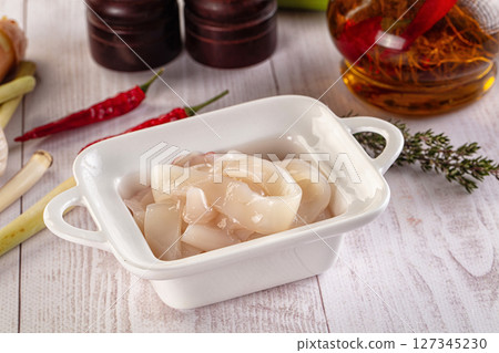Raw squid rings for cooking 127345230