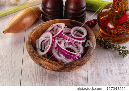 Sliced red onion rings heap Sliced red onion rings heap 127345231