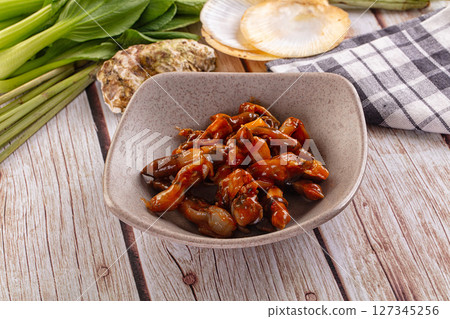 Razor shell mollusk with sauce Razor shell mollusk with sauce 127345256