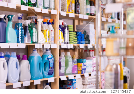 Products on shelves of household chemicals store 127345427