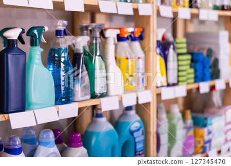 Assortment of kitchen and window cleaning products in the household goods department of supermarket 127345470