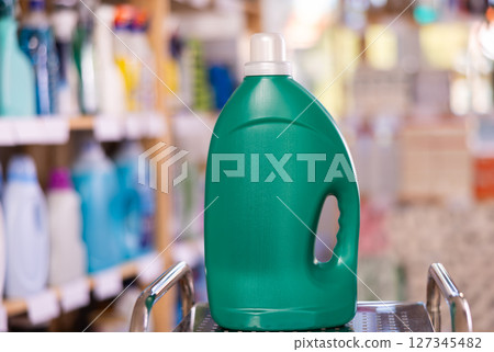 Shelf lined up with liquid detergent, household department assortment. 127345482