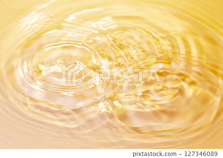 Drops of water falling on the surface of the water. 127346089
