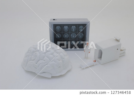 Mini Doctors Analyzing Medical X Rays in Clinical Setting Mini Doctors Analyzing Medical X Rays in Clinical Setting 127346458