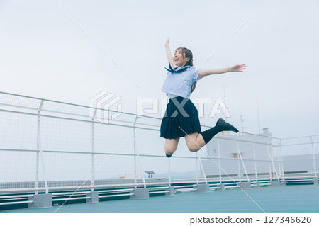 high school girl jumping high school girl jumping 127346620