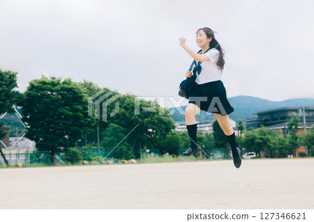 high school girl jumping high school girl jumping 127346621