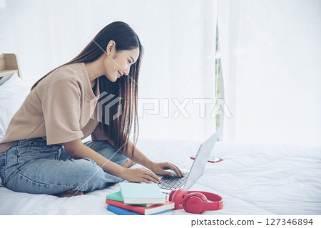 Empty Green Screen laptop Blogger Woman hands typing Laptop computer keyboard. Close up women hands using laptop sitting sofa living room. Freelance women work from home office video call conference Empty Green Screen laptop Blogger Woman hands typing Laptop computer keyboard. Close up women hands using laptop sitting sofa living room. Freelance women work from home office video call conference 127346894