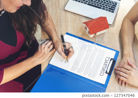 Close up Team Businesswoman hands partners sign contract with success business deal. Diversity Businesswoman teams handshake together. Partnership teamwork meeting signing contract business concept Close up Team Businesswoman hands partners sign contract with success business deal. Diversity Businesswoman teams handshake together. Partnership teamwork meeting signing contract business concept 127347046