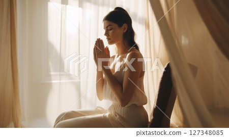 Yoga Meditation. Woman practicing Yoga in easy position at home on yoga matt indoors 127348085
