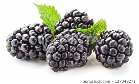Fresh, ripe blackberries with green leaves on a white background, perfect for showcasing healthy fruit, summer harvests, and delicious natural ingredients. 127348271