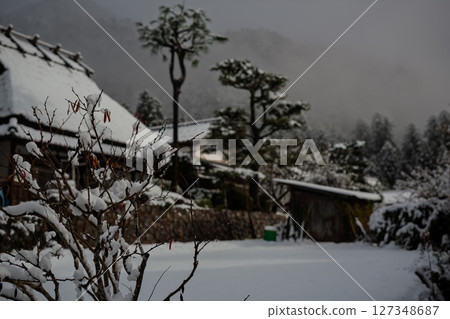 This photo was taken in Miyama-cho, Nantan-shi, Kyoto, in thatched roof village covered with snow. This photo was taken in Miyama-cho, Nantan-shi, Kyoto, in thatched roof village covered with snow. 127348687