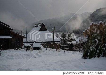 This photo was taken in Miyama-cho, Nantan-shi, Kyoto, in thatched roof village covered with snow. This photo was taken in Miyama-cho, Nantan-shi, Kyoto, in thatched roof village covered with snow. 127348688