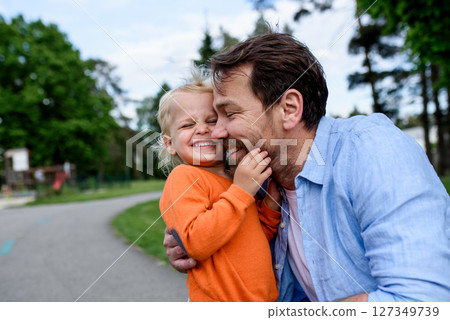 Portrait of dad and child enjoying time together Portrait of dad and child enjoying time together 127349739