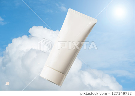 Skin care cream tube and blue sky 127349752