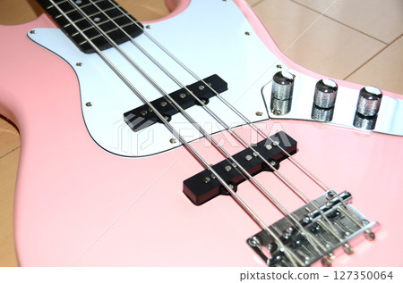 Electric guitar, bass, sheet music and music images Electric guitar, bass, sheet music and music images 127350064