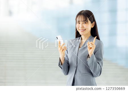 Young business woman, smartphone Young business woman, smartphone 127350669