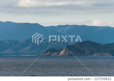[Tokyo Kyushu Ferry bound for Mayu Shinmoji sails off the coast of Cape Ashizuri] 127350812
