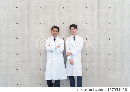 Male doctors in white coats Male doctors in white coats 127351418
