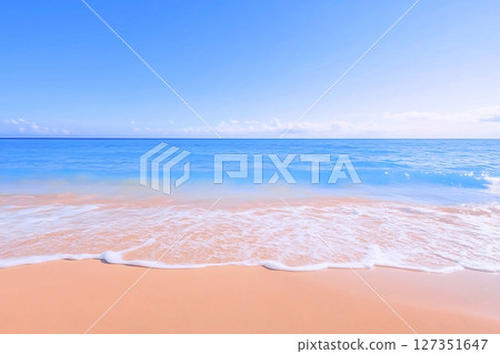 Seaside scenery of a sandy beach with clear waves 127351647