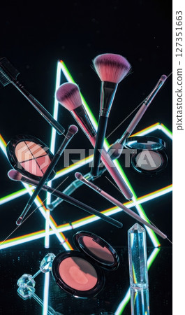 Beauty Tools and Cosmetics Floating in Prismatic Summer Light for Vibrant Makeup Mockup and Branding 127351663