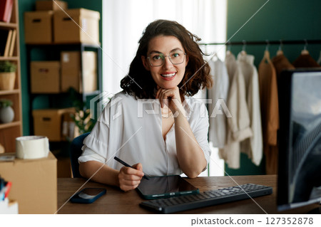 designer is working in studio 127352878