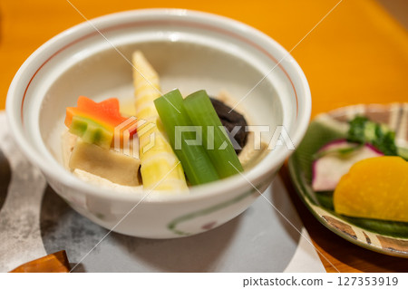 Cooked seasonal vegetables with tofu, bamboo, shiitake, carrot and green onion Cooked seasonal vegetables with tofu, bamboo, shiitake, carrot and green onion 127353919