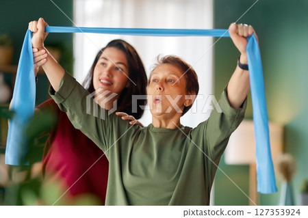 Senior woman doing exercise 127353924