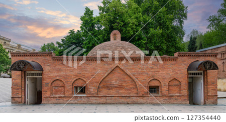 Historic 17th-Century Chuba Hammam: Brick Facade and Dome at Sunset in Ganja, Azerbaijan 127354440