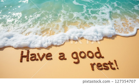 Relaxing beach scene with calming waves and warm sand inviting a good rest 127354707