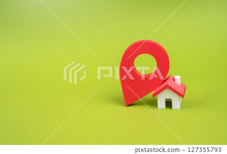 Red sign and residential building. Good location. Marking of territories and areas. Geodesy. Territorial boundaries, urban planning, or geodetic surveying. 127355793
