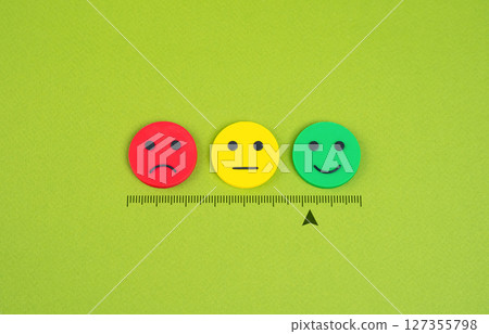 Satisfaction scale. Dissatisfied, indifferent, satisfied. Moods. Approval, indifference or disapproval. Mood levels, customer feedback, or approval ratings. 127355798