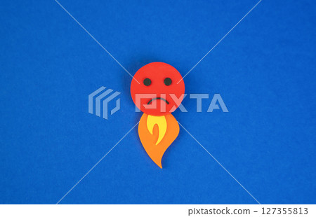 Upset, very angry. Metaphor of fire from behind. Unrestrained emotions. Extreme anger, frustration, and emotional intensity. Boiling emotions and mental burnout. 127355813