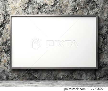 Blank frame hanging on a textured stone wall in an empty indoor space for creative ideas Blank frame hanging on a textured stone wall in an empty indoor space for creative ideas 127356270