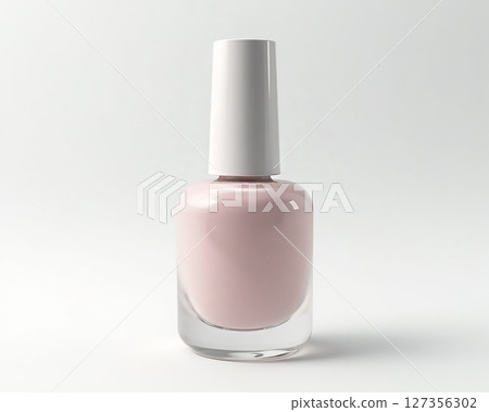 Elegant pale pink nail polish bottle on a clean white background showcasing its smooth finish and modern design 127356302