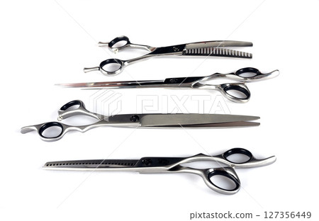 pair of scissors in studio 127356449