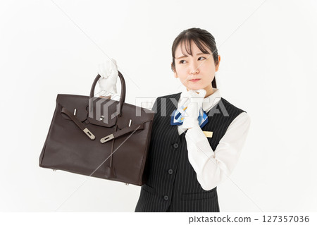 Woman in uniform Appraisal Purchase Thinking Woman in uniform Appraisal Purchase Thinking 127357036