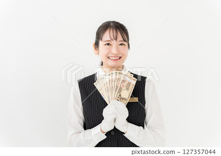 A woman with money A woman with money 127357044