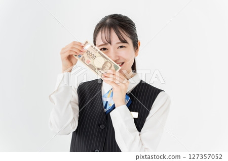 A woman with money 127357052