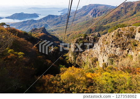 Autumn in Shodoshima: Autumn leaves in Kankakei Gorge, view from the ropeway Autumn in Shodoshima: Autumn leaves in Kankakei Gorge, view from the ropeway 127358002