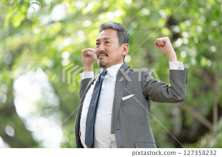 Businessman portrait fresh green growth 127358232