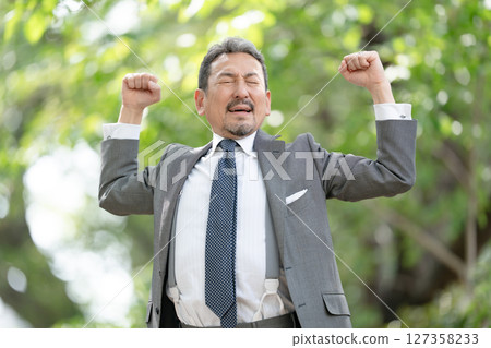 Businessman portrait fresh green growth 127358233