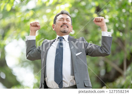 Businessman portrait fresh green growth Businessman portrait fresh green growth 127358234