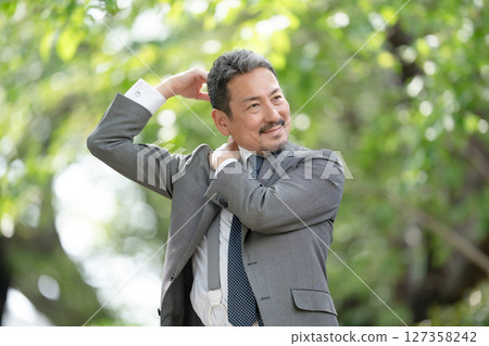 Businessman portrait, fresh green, stiff shoulders Businessman portrait, fresh green, stiff shoulders 127358242