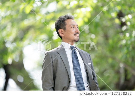 Businessman portrait fresh green Businessman portrait fresh green 127358252