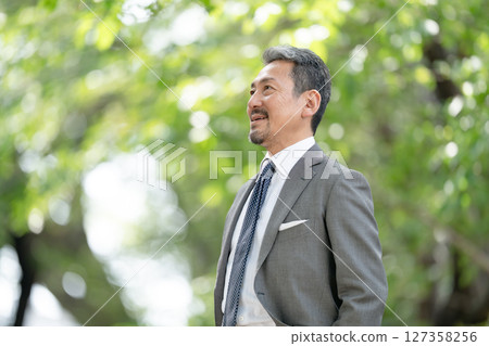 Businessman portrait fresh green Businessman portrait fresh green 127358256