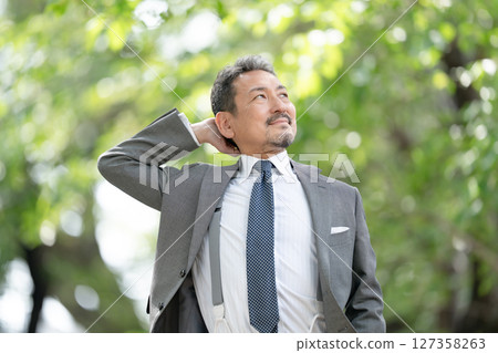 Businessman portrait fresh green growth Businessman portrait fresh green growth 127358263